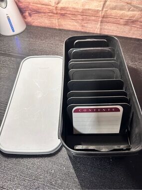 vintage Tupperware Memory Mates shutter box with a black base, gray lid